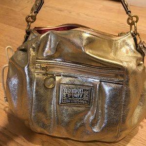 Gold coach bag